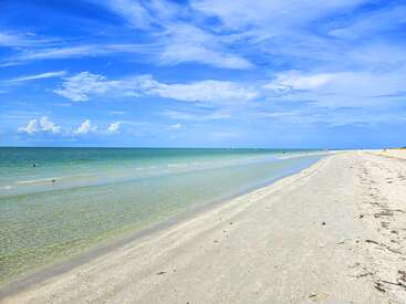 [Translate to deutsch:] Atembraubender Strand und klares Meer vom Golf auf Sanibel Island