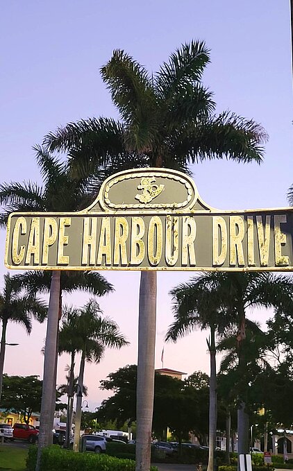 Promenade with shops selling souvenirs, t-shirts, art, and pictures, plus restaurants at Cape Harbour in Cape Coral, Florida