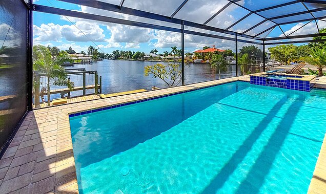 Private pool and spa with stunning water view at Villa Zeladace in Cape Coral, Florida