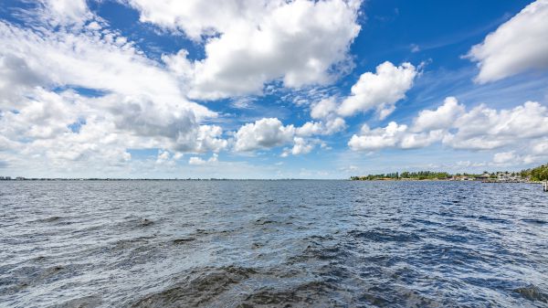 SOLD 2023: Riverfront lot in Yacht Club area - South facing 11