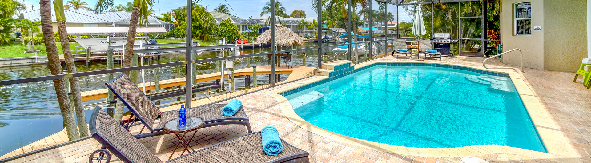 $879,000 - Turnkey - Sunsets - Boat Dock - Tiki